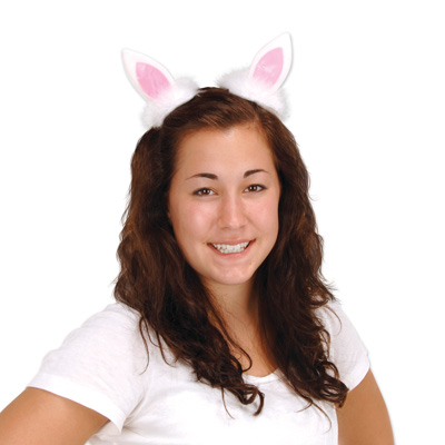 Plush bunny ears on a metal hair clip and faux material.