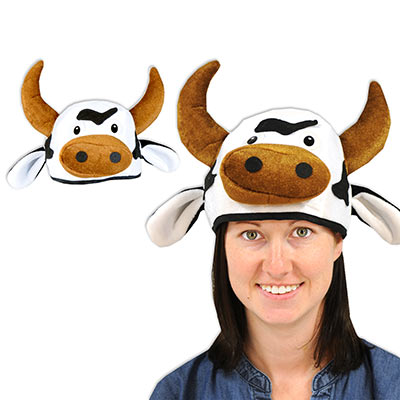 Plush hat that is designed to replicate a cow with horns.