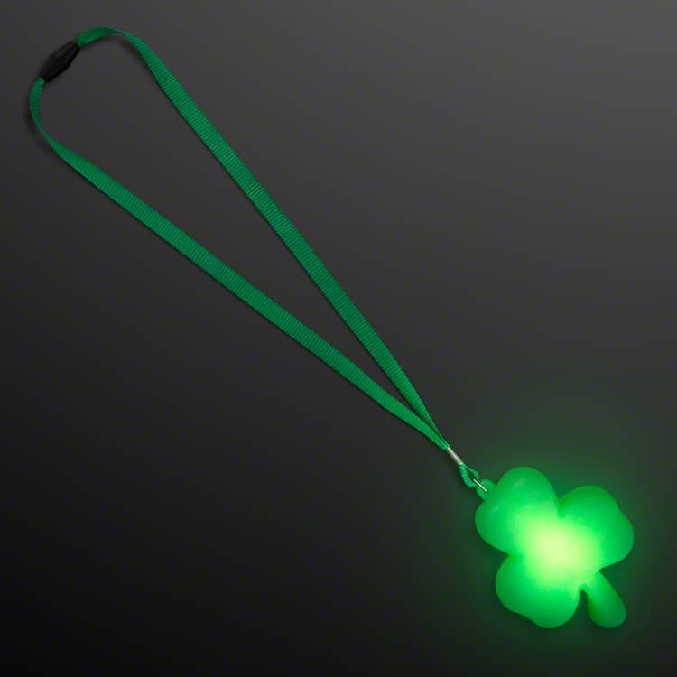 Big Light Up Shamrock Necklace for St. Paddys Day (Pack of 12) shamrock light up necklace, St. Patrick’s Day LED necklace, flashing shamrock charm, green LED necklace, St. Paddy’s Day accessories, AG13 battery necklace, jade ribbon necklace, Party Express shamrock necklace, pack of 12 LED necklaces