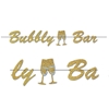 Gold glittered streamer that reads "Bubbly Bar" in card stock material and includes two champagne glasses clinking together.