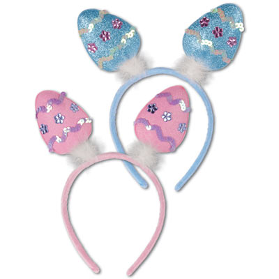 Material covered headband in with eggs attached in pink or blue.