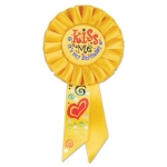 Kiss Me, It's My Birthday Yellow Rosette has multi colors of metallic lettering with heart/swirl designs