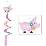 Various colored pink material whirl with a pig at the top and spiraled pink tassel at the bottom.