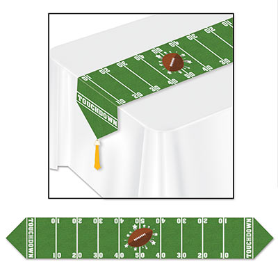 Green table runner with football in the center and field lines.