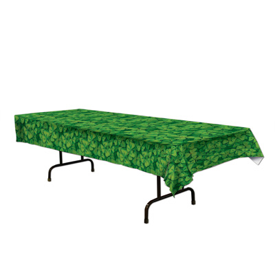 plastic table cover with green shamrocks printed on it
