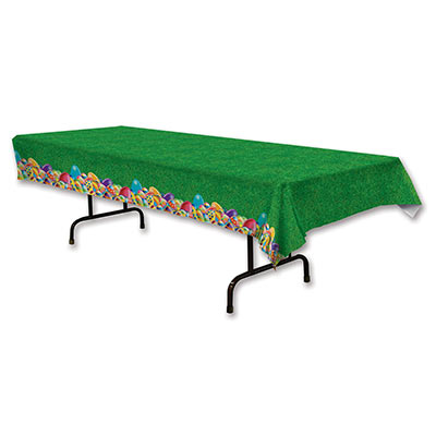 plastic table cover for Easter that looks like grass on the top and colored Easter eggs along the sides