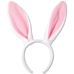 pink fuzzy pink bunny ears on a white headband