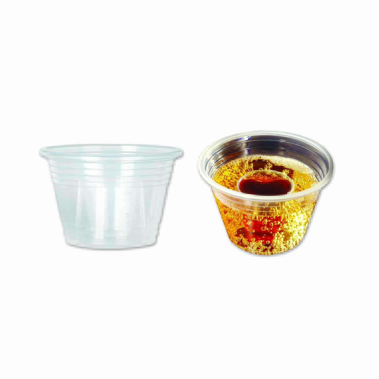 Plastic disposable cups with built in shot glass for a mixture of two drinks. 