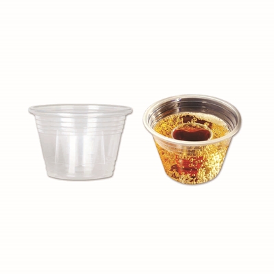 Plastic disposable cups with built in shot glass for a mixture of two drinks. 