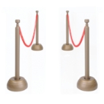 red ropes attached to gold posts used for forming organized lines