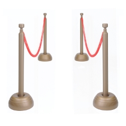 red ropes attached to gold posts used for forming organized lines