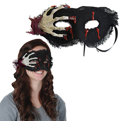 Halloween mask with a scary hand grasping at the wearers face