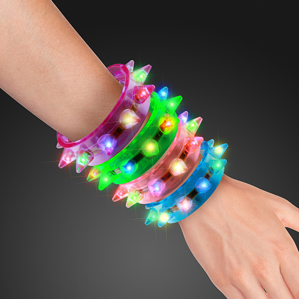 Flashing Spike Bracelet Cuffs (Pack of 12) Flashing Spike Bracelet Cuffs, flashing, spike, bracelet, light up, new years eve, 80s, party favor, wholesale, inexpensive, bulk