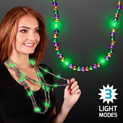 Light Up Beads Mardi Gras Necklace with three light modes. These light up necklaces are the perfect addition to your mardi gras party outfit.