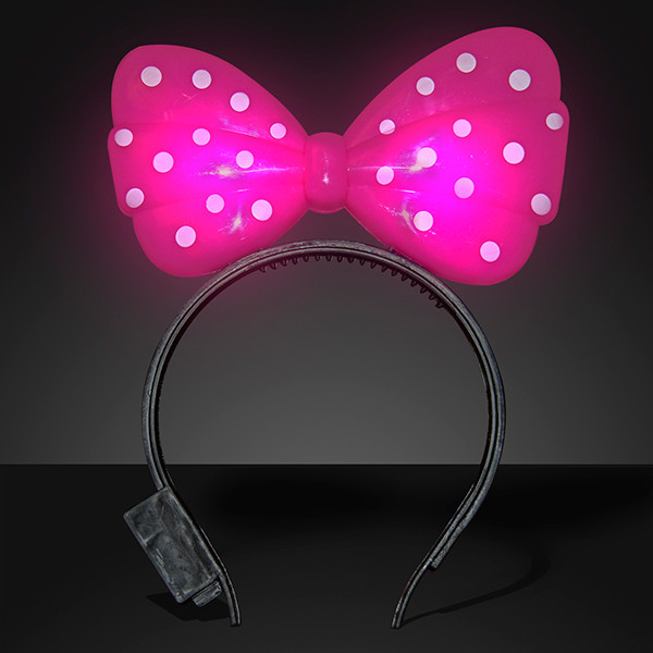 Light Up Pink Big Bow Headband. This Pink Big Bow Headband is a great accessory for a glow in the dark party.