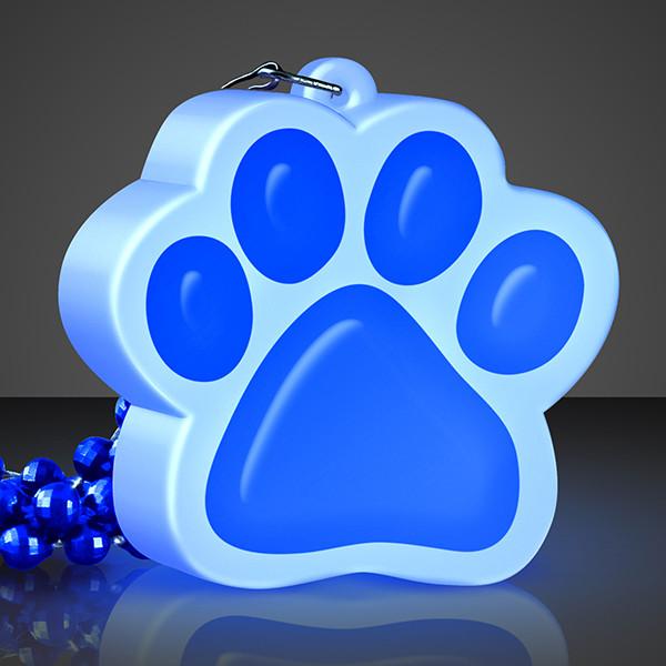 Light Up Blue Paw Print Necklace. This Light Up Blue Paw Print Necklace is perfect for glow in the dark parties.