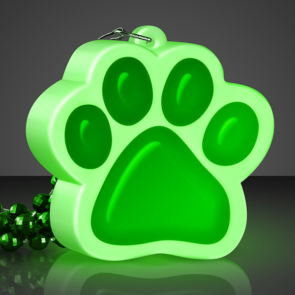 Light Up Green Paw Print Necklace. This Light Up Green Paw Print Necklace is perfect for glow in the dark parties.