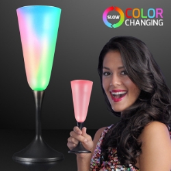 LED Champagne Glass with Black Base. This LED Champagne Glass will add a little flare to drinking.