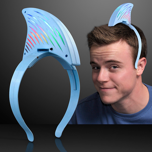 Light Up LED Shark Fin Headband. This LED Shark Fin Headband will show everyone who is king of the sea.