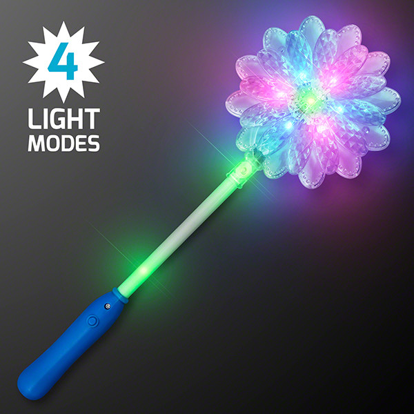 Daisy flower wand that lights up in various colors. 