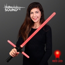 Red light up cross saber with space sounds.