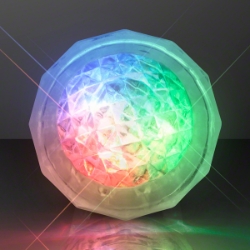 Rave ring with light trails that lights up with a rainbow colored flash.