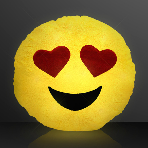 Emoji pillow that lights up with heart eyes and a smile.