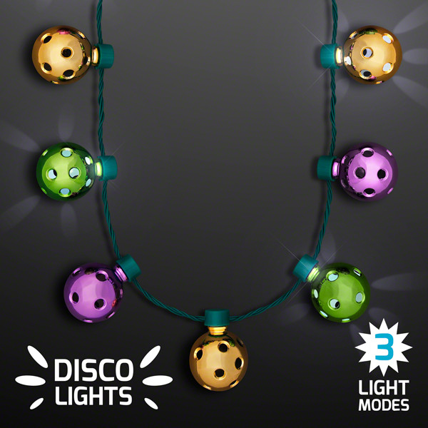 Necklace with gold, green and purple disco balls that lights up.