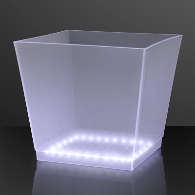 Bottle service ice bucket that lights up with white LED lights. 
