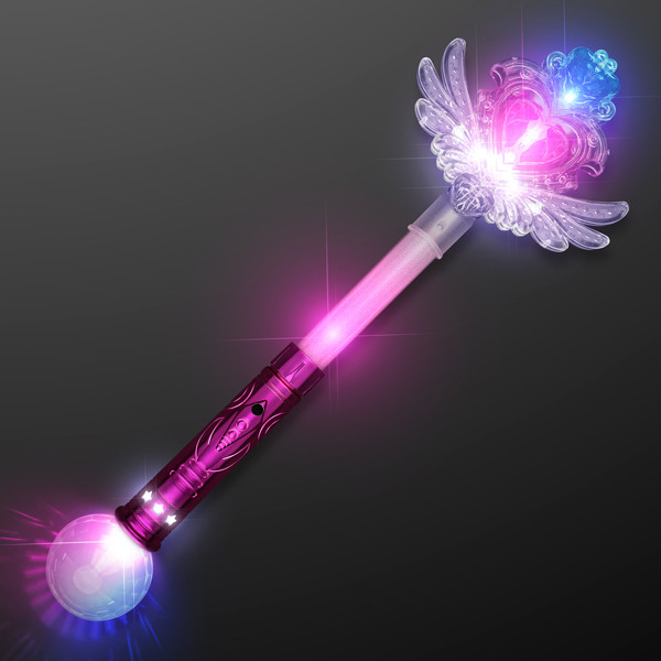 Winged heart wand that lights up white, blue and pink LED lights. 