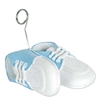 Balloon weights of blue baby shoes with metal balloon holder.