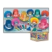 Bright colored new year's eve party kit with multi-colored party hats, glittered tiaras, party horns, and bright colored noisemakers.