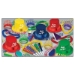 Bright colored NYE party kit with top hats, leis, noismakers, and beads
