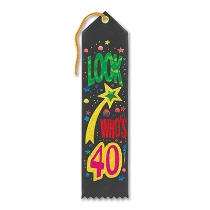 Look Who's 40 Award Black Ribbon with Green and Red bold lettering and a shooting star