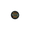 Older Than Dirt Satin Black Button with gold and silver lettering and red swirl designs 