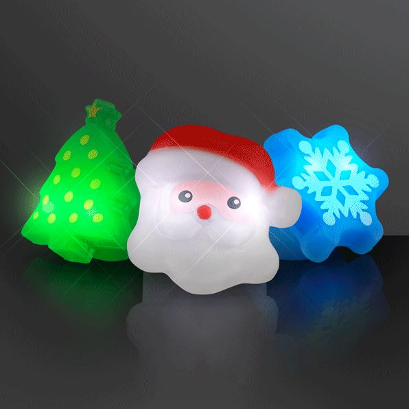 Christmas rings that lights up in shapes of a Christmas tree, Santa and a snowflake.