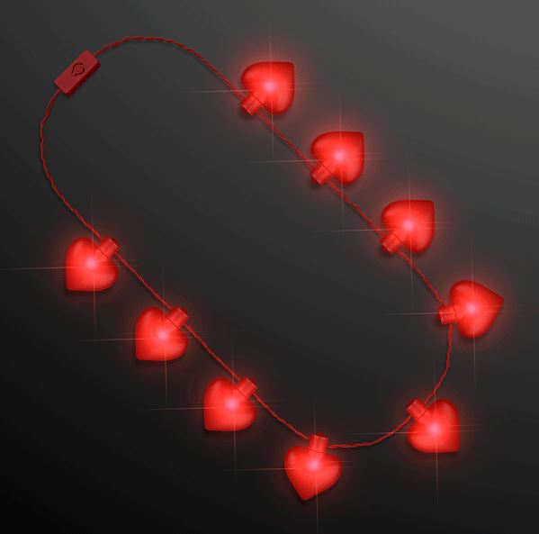 Necklace with hearts attached and lights up with LED lights. 